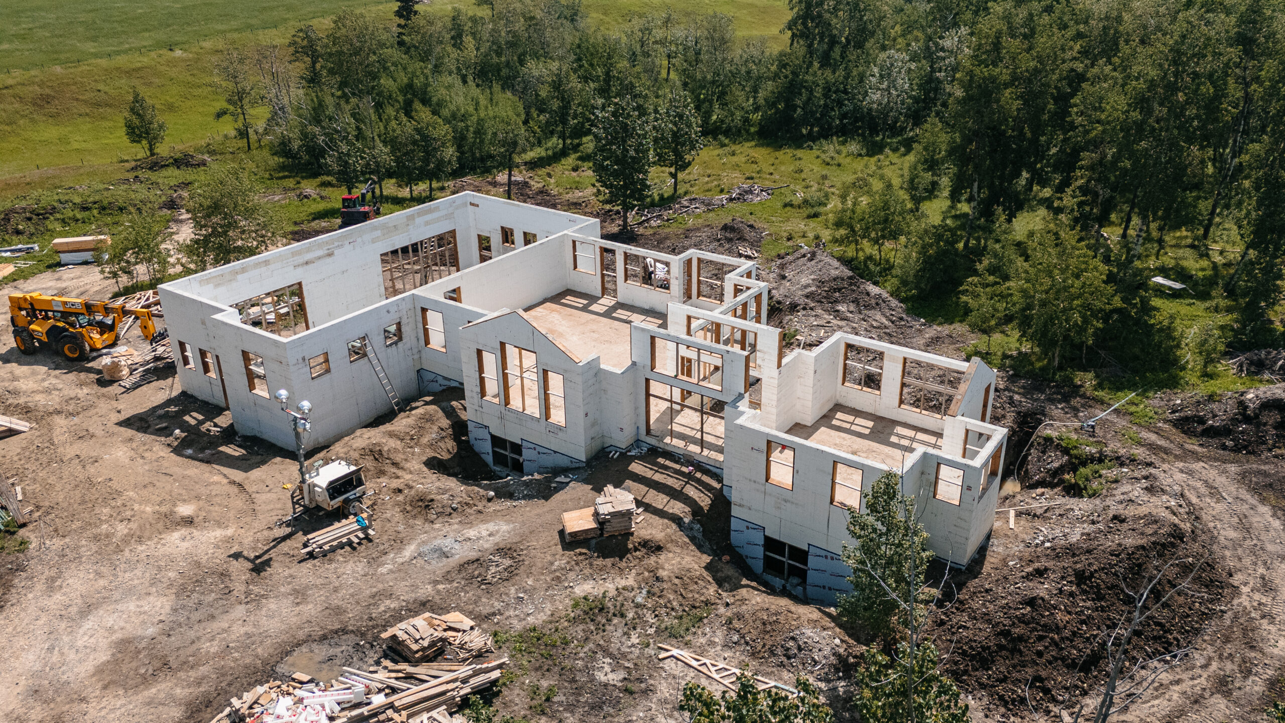 This image depicts walls with ICF blocks being stacked.