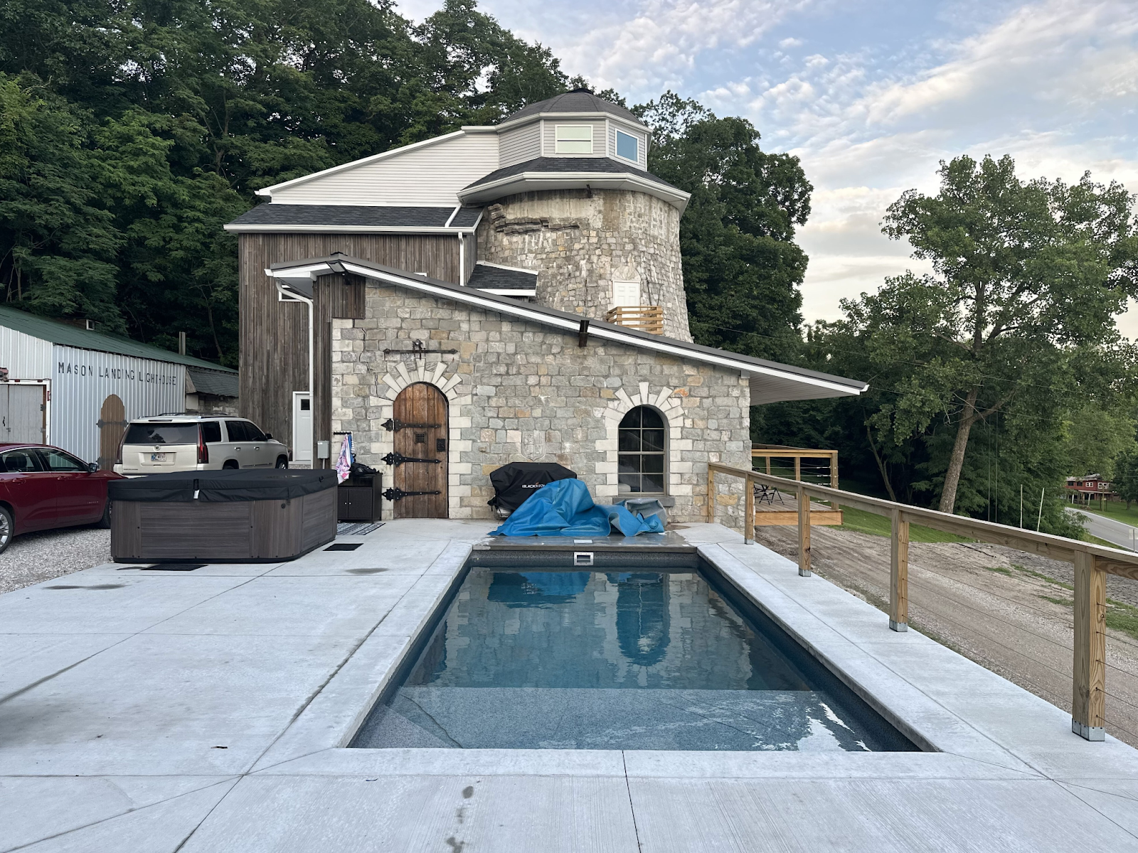 A stunning, finished rectangular ICF pool is surrounded by concrete decking.