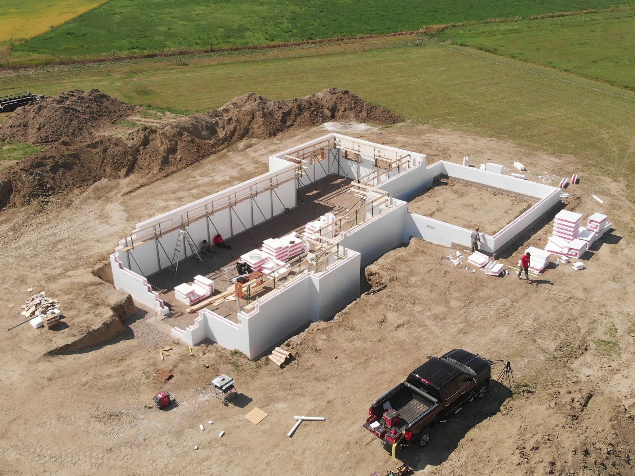 A single-family home has insulated concrete form walls being installed.